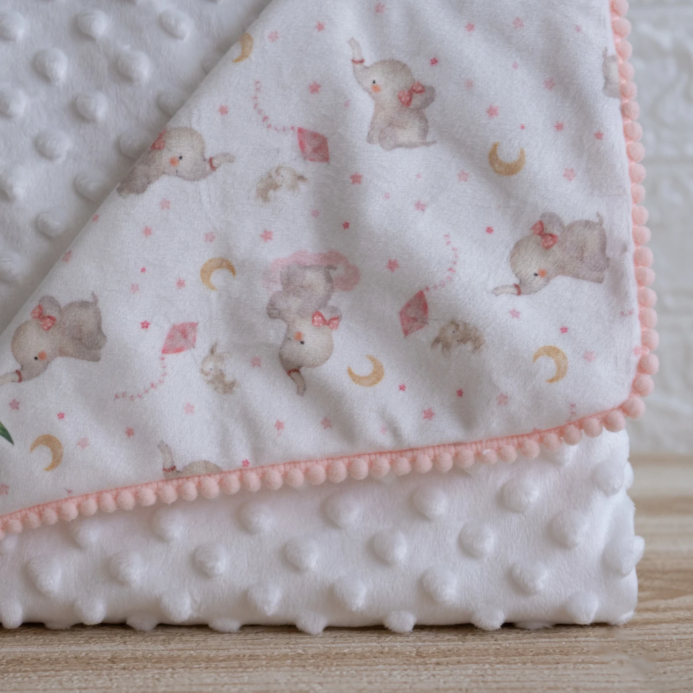 manta bebe pompones elefantes rosa